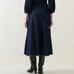 High-Rise Fringed Denim Flared Skirt