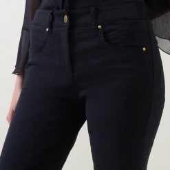 Mid-Rise Slim Leg Jeans